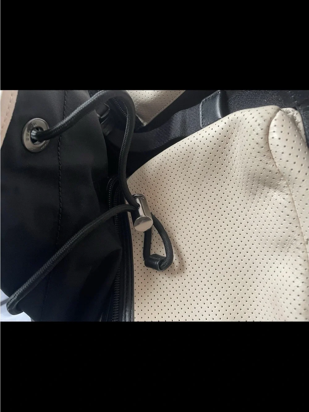 Coach Two-Tone Cream and Black Perforated Leather Backpack